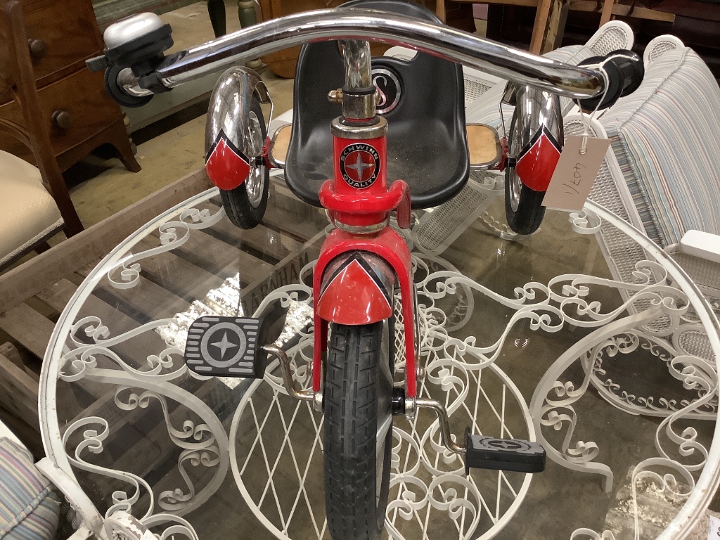 A Schwinn child's tricycle, length 84cm